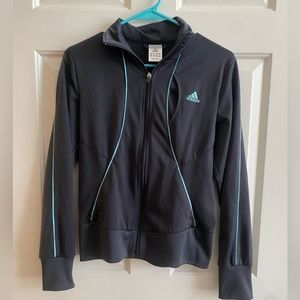 Adidas women’s zip up jacket in grey. Size small.